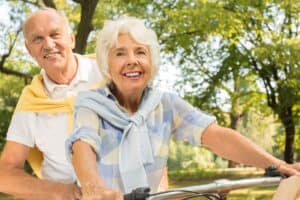 two persons in a bike