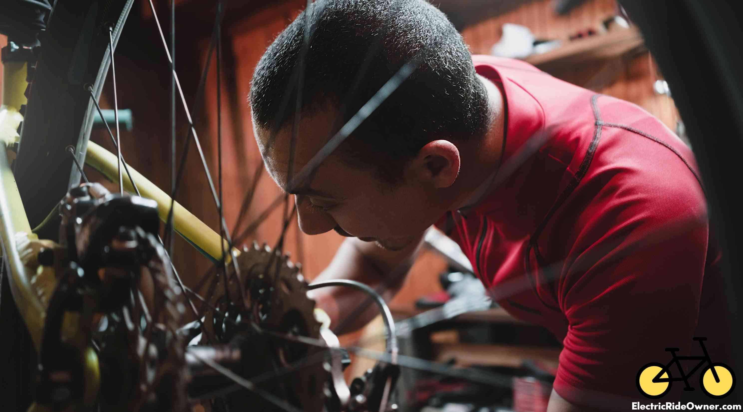 e-bike mechanic repairing a bike