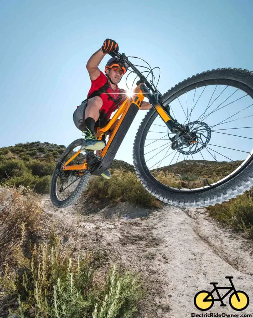 cyclist jumping with e-bike