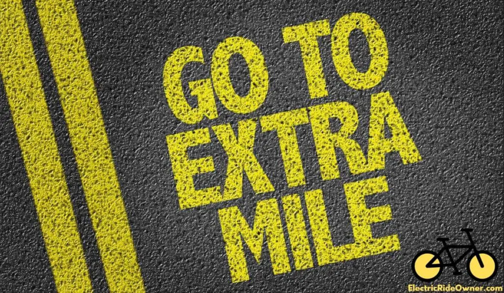 go to extra mile written on the road