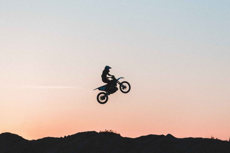 motorized bike jumping silhouette