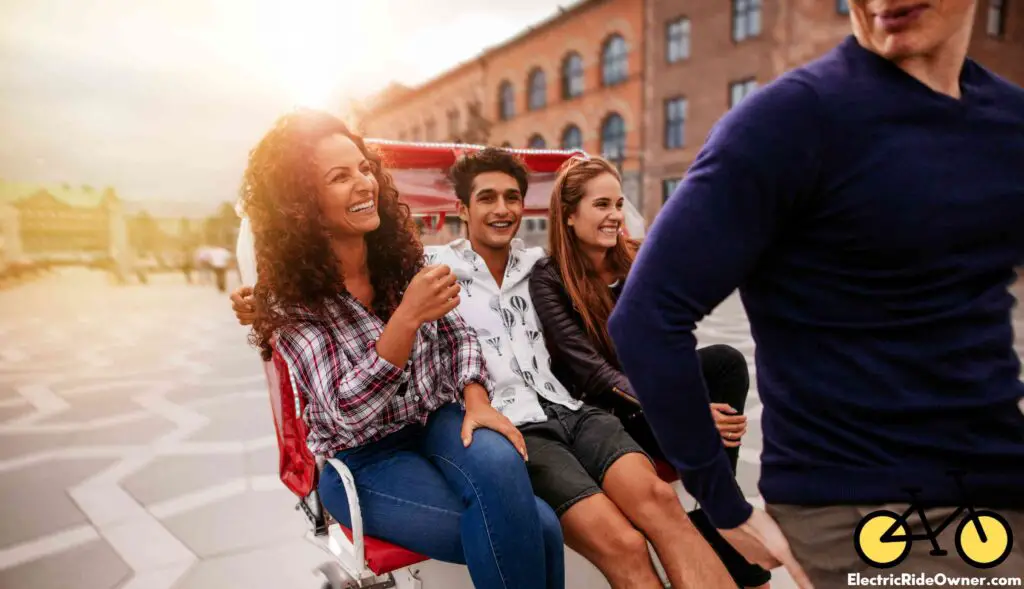 friends enjoying tricycle ride