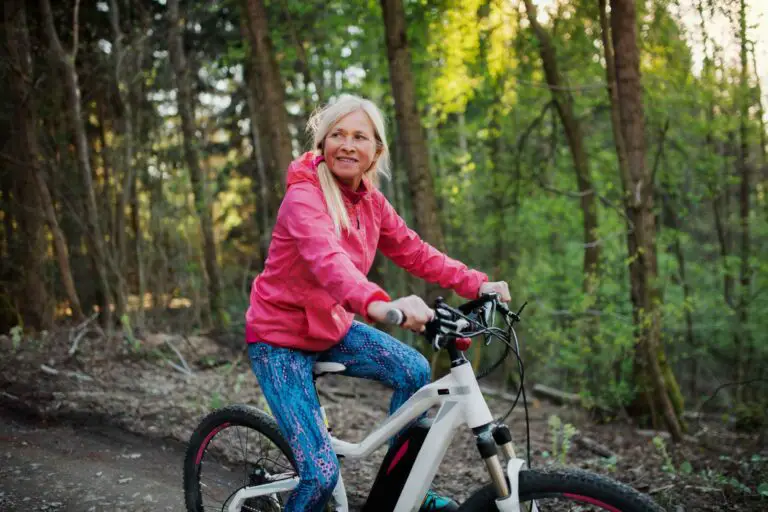 senior woman riding an e-bike